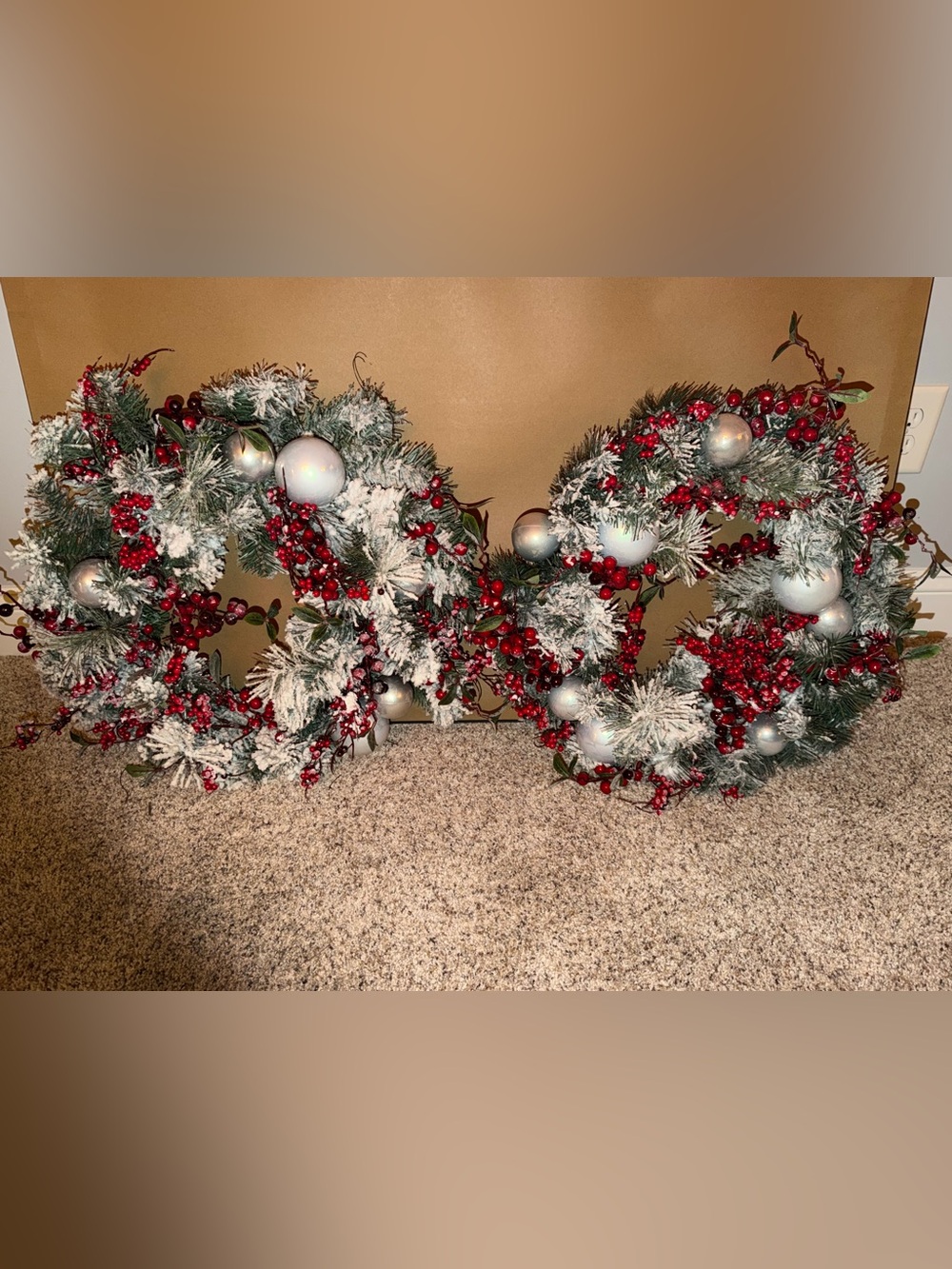 Flocked Pine Holiday Garland with Red Berries and Silver Ornaments
